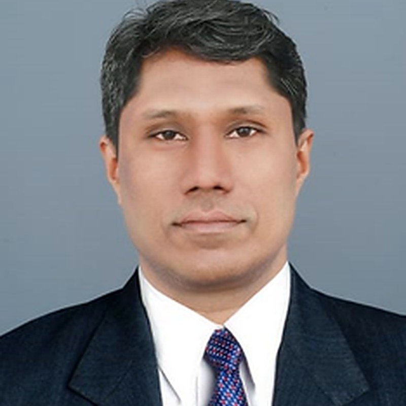 Portrait of Dr. Anil K Ayyappan, Ayurvedic physician, at Abhaya Clinic